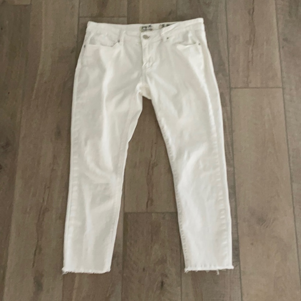 Juniors white jeans. Size 13 frayed bottoms.